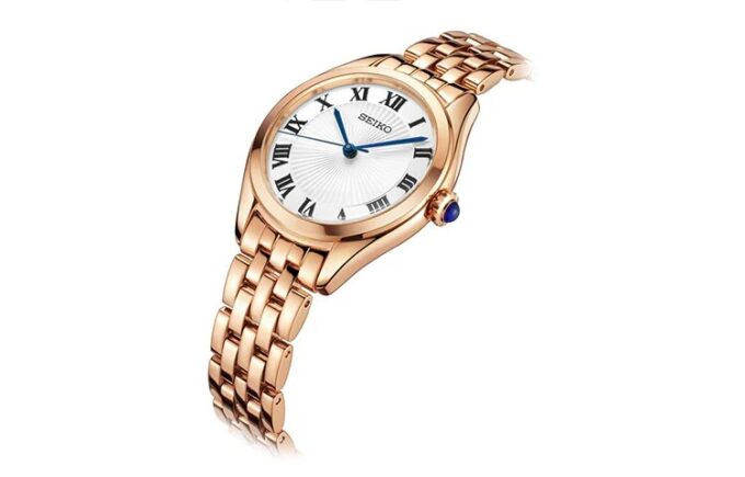 Reloj de moda con esfera azul y blanca, correa de oro rosa, resistente al agua hasta 5 ATM y mecanismo de cuarzo